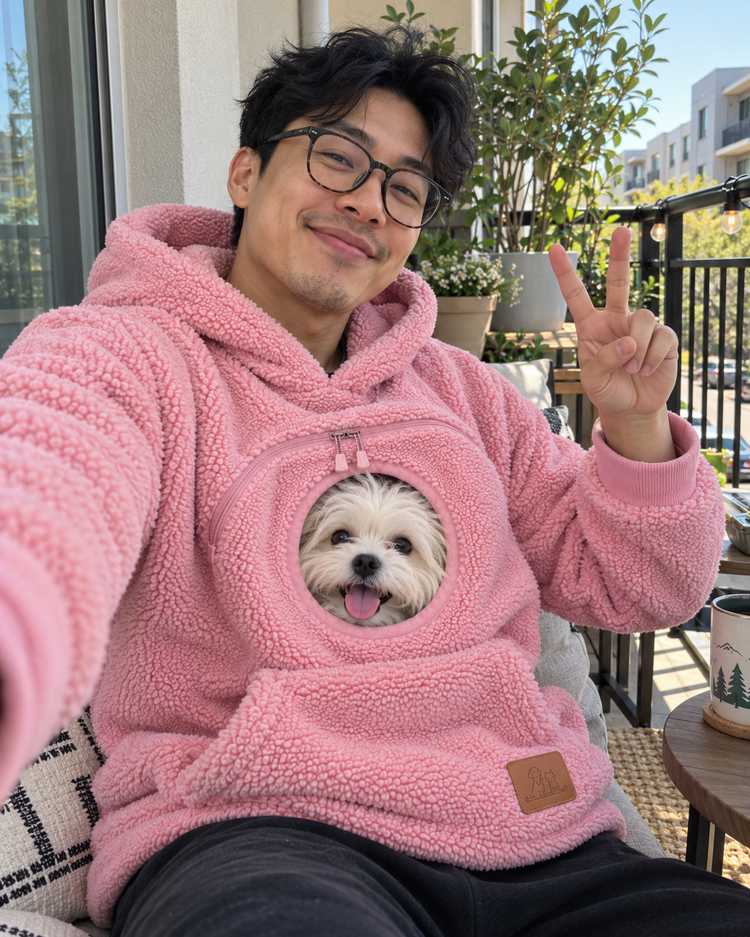 Customer wearing the Doggy Pocket Hoodie with their dog